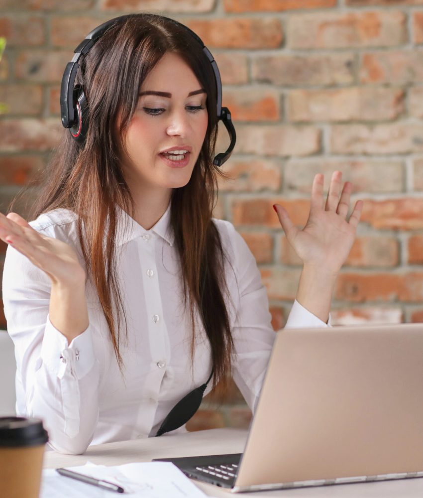 Woman working in call center as dispatcher